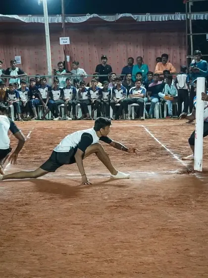 Omkar Sonawane stretching for a tag.