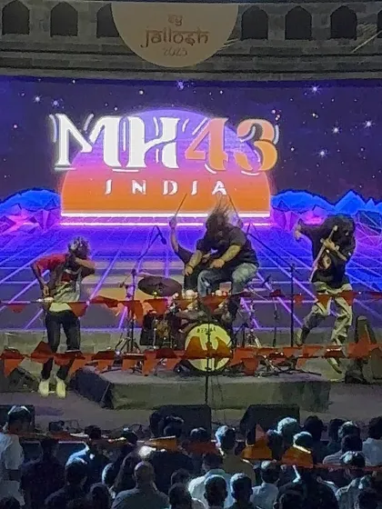 Full band, full power. This was us owning the stage for Ernst & Young in Pune. With our name lighting up the background, we delivered a high-octane performance that the crowd won't forget anytime soon.