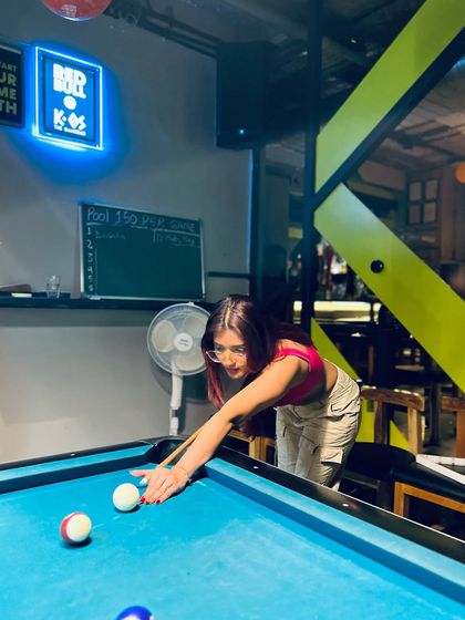 Lining up the winning shot. Our pool table is a popular spot for date nights and hangouts, offering a fun way to show off your competitive side.