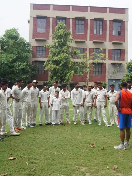 A coaching session on the field. We gather our players to discuss strategy, technique, and the mental side of the game. This is where we build a strong cricketing mind.