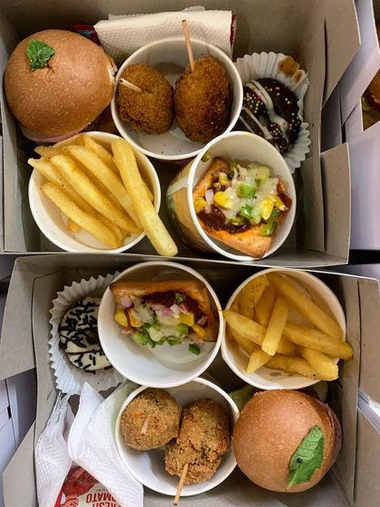 A top-down view of my party snack boxes, showing the variety of treats I can pack for your event. Each box is a mini feast for kids and adults alike.