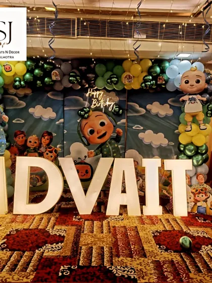 Keeping up with the latest trends is key to creating parties kids love. This Cocomelon-themed first birthday featured a full character backdrop, marquee letters spelling out the birthday boy's name, and a colourful balloon arrangement, making it an immersive and fun experience.