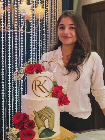 Here I am with the finished 3kg engagement cake, ready for delivery. It's always a proud moment to see a big project come together perfectly.