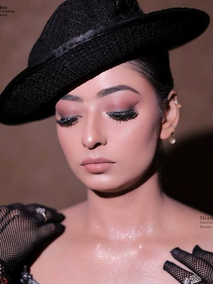 This vintage-inspired look with a classic hat and soft smokey eyes is perfect for themed parties or editorial shoots. You'll learn to create looks from different eras.
