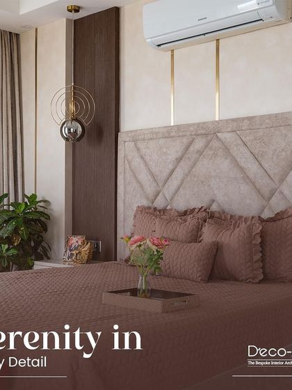 Serenity in every detail. This bedroom embraces tranquility with its soothing colour palette, geometric headboard, and elegant gold accents. It is your personal sanctuary of calm.