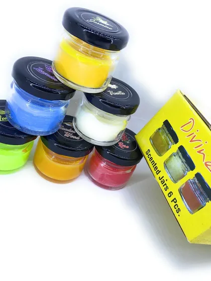 My scented jars are easy to stack and store. Here you can see a playful arrangement next to the "Divine" gift box they come in, ready for gifting.