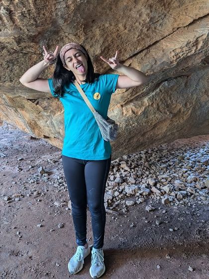 Meet Sudha, a mental health professional who found her passion for climbing at a festival in Badami. Her playful pose captures the fun and carefree spirit of our community.