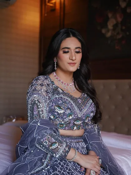 The cocktail glam of your dreams. This lavender lehenga is so unique, and I paired it with a soft smokey eye and glossy lips.