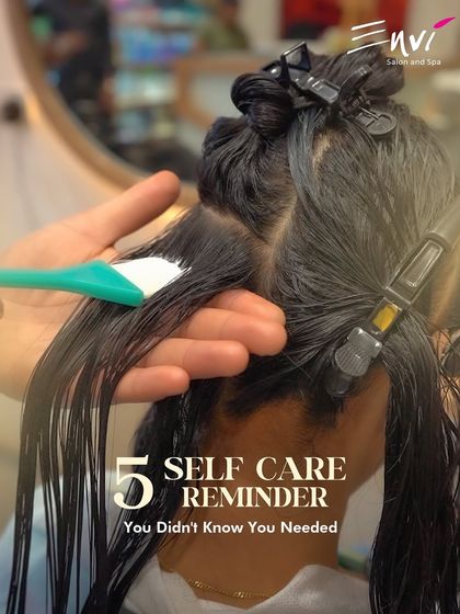 A self-care reminder you didn't know you needed. This image captures the application of a nourishing hair masque, a crucial step in our treatment process.