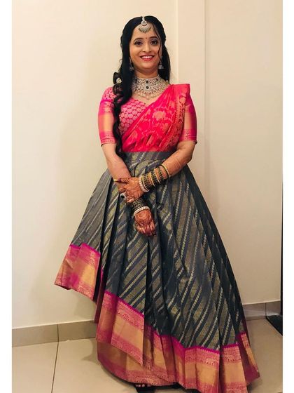 A full-length view of the half-saree look. This is a popular choice for pre-wedding events, and I styled the makeup and hair to be both traditional and chic.