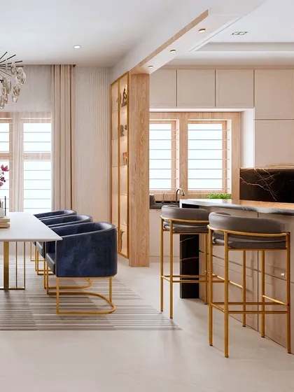 This contemporary dining space is all about blending luxury with comfort. We paired bold, blue velvet chairs with sleek gold-finished frames and a minimalist dining table to create a sophisticated yet welcoming atmosphere for every meal.