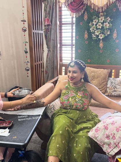 A happy bride getting her mehendi done at my studio. My students often get to observe real client sessions, which is an invaluable part of the learning experience.