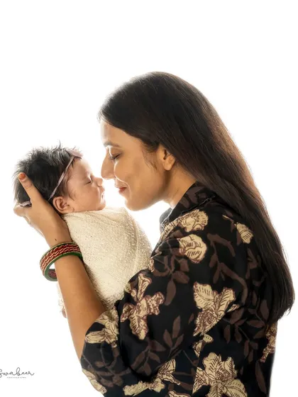 A nose-to-nose moment between mother and baby, capturing the sweet, unspoken language of love. These are the fleeting moments I aim to preserve for you.