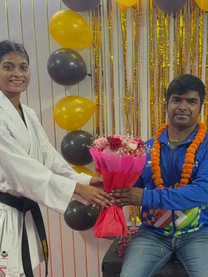 A student showing her respect and appreciation on Teacher's Day. The bond between a coach and student is the foundation of success.