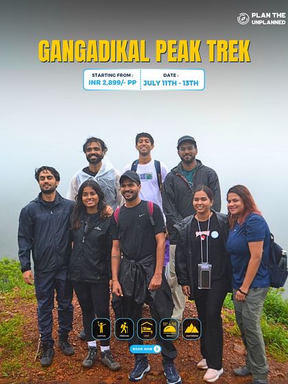 A group of trekkers on the Gangadikal Peak trail, enjoying the views.