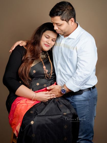 A tender and emotional moment between the couple. This pose captures the quiet intimacy and support they share.