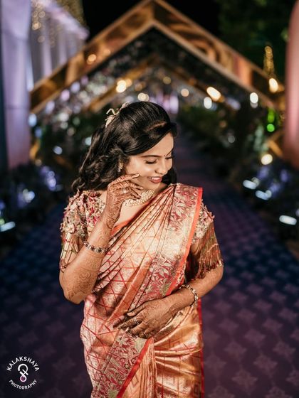 A beautiful candid shot of the bride smiling during her reception.