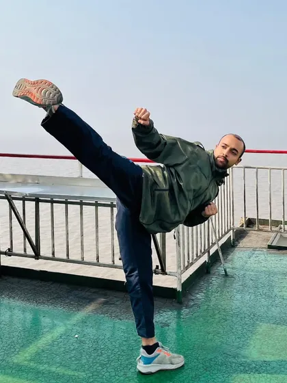A duplicate of my high kick photo, capturing the technique from a slightly different angle.