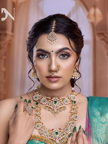 Crafted with a unique sense of fashion. This look, with its smokey green eyes, is a perfect example of the traditional makeovers I teach.