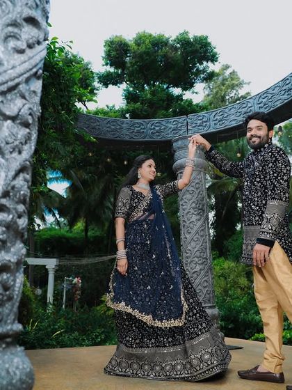 A couple dances at our stone gazebo, showcasing the beautiful architecture and natural surroundings.