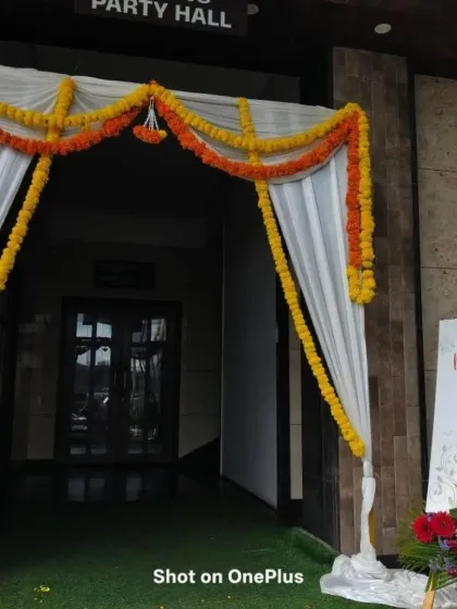 This welcome board for a baby shower combines a beautiful photo of the mother-to-be with event details. It serves a practical purpose while also adding a deeply personal element to the entrance decor.