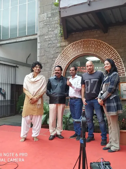 A group photo with the faculty and organizers of the Impressions festival at COEP.