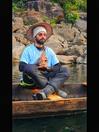 A moment of peace on the Dawki river. This image showcases a quieter, more contemplative side of my adventure modeling, suitable for wellness and travel brands.