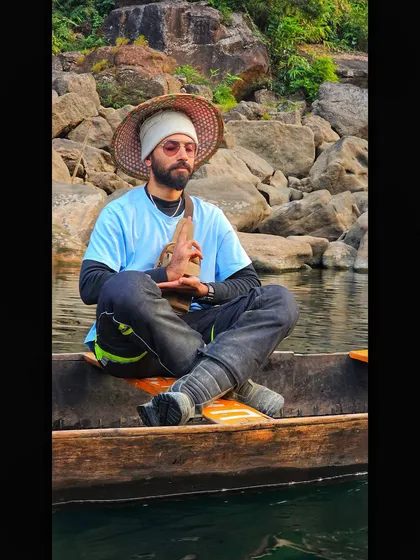 A moment of peace on the Dawki river. This image showcases a quieter, more contemplative side of my adventure modeling, suitable for wellness and travel brands.