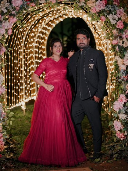 A full shot of the floral and light archway, showing how it creates a beautiful and grand frame for couple portraits.