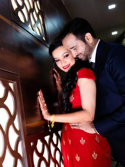 A tender and romantic hug captured during the reception. These quiet moments amidst the celebration are just as important as the grand ones.