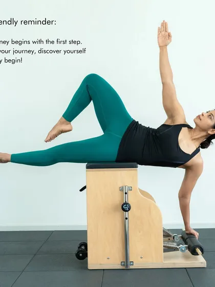 A friendly reminder that every journey begins with a single step. This beautiful side plank on the Pilates Chair shows the strength and grace you can build.