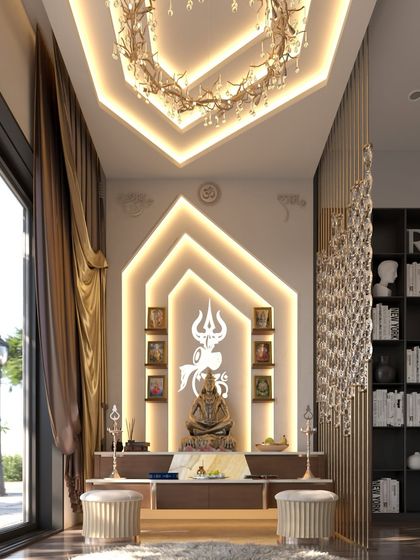 This modern Shiva Mandir design is a masterpiece of spiritual elegance. It features a backlit Trishul, a serene Shiva idol, and a grand chandelier, all framed by luxurious curtains and wall panels.