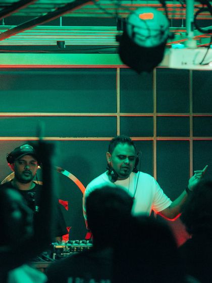 A shot of me and a fellow DJ in the booth at Gawky Goose.