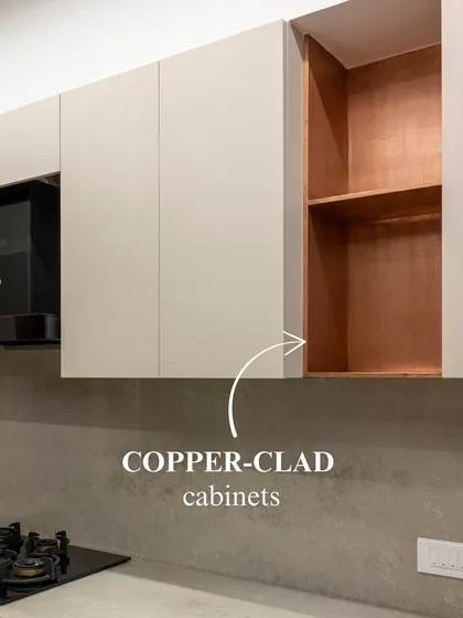 The beauty of this kitchen is in its unexpected details. The cabinets are clad in real copper, giving them a modern yet rustic warmth that feels both timeless and unique.