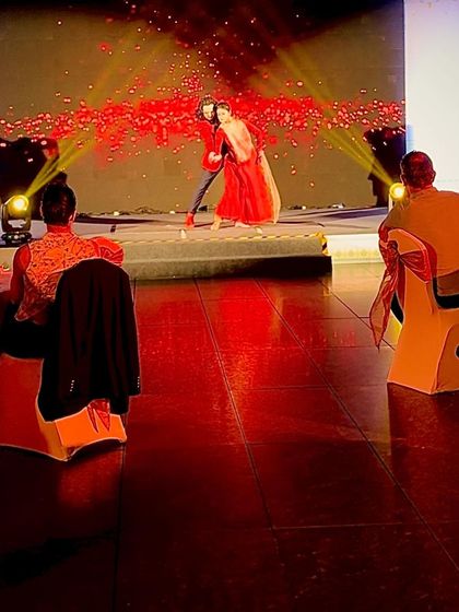 A view from the audience of our Flamenco-Kathak duet on a beautifully lit stage.