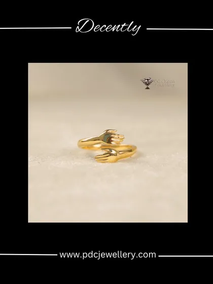 A decent and charming "hug" ring in 22kt gold. This simple and symbolic design is a sweet accessory for everyday wear.