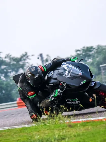A duplicate shot emphasizing the commitment of our riders, pushing their bikes to the absolute edge in pursuit of speed.