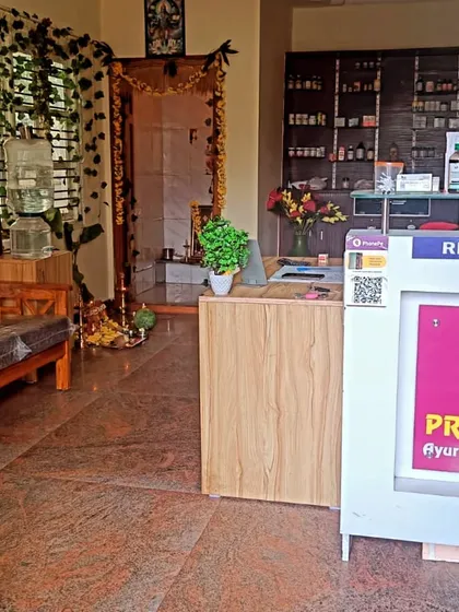 This is the reception area of my clinic, Prakruthi Ayurveda & Wellness. I have designed this space to be calm and welcoming, so your healing journey begins the moment you step inside.