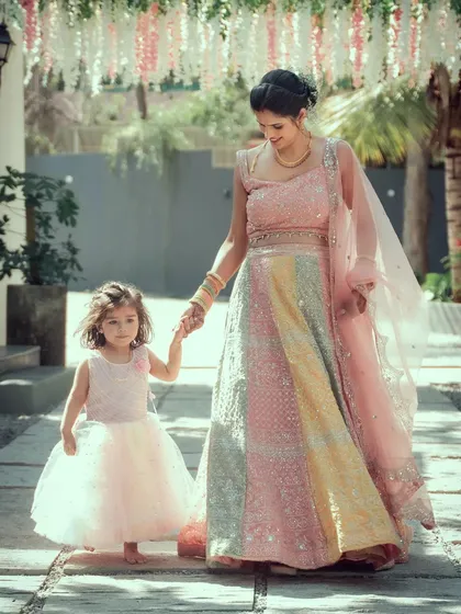 A tender moment between a mother and her daughter on a special day. Our family photography focuses on genuine connections, creating timeless portraits that celebrate your bond across generations.