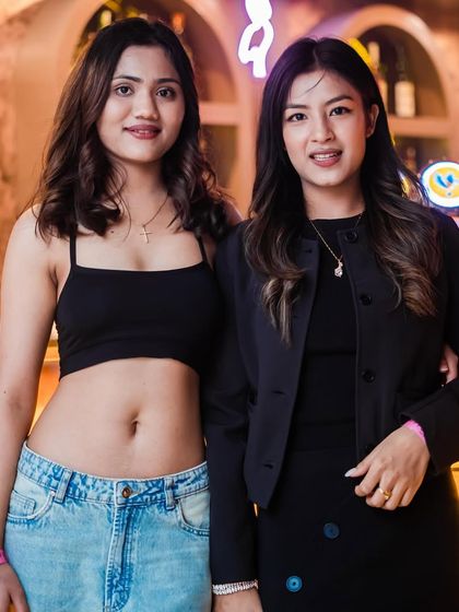 Friends enjoying the night at Happy Brew. It's the perfect spot for a group outing.