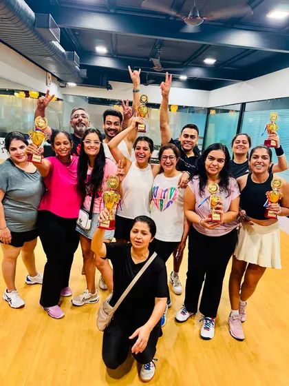 The whole squad celebrating after the Ninja Dojo Duel. The energy and excitement of our community events are contagious.