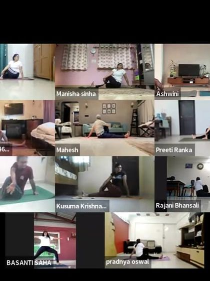 A wide gallery view of our 6 AM online class, with students practicing a seated twist. This shows the scale and reach of our online community, all practicing in unison.