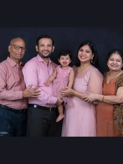 Three generations, one beautiful portrait. Capturing the entire family, including grandparents, creates a powerful legacy photo that tells a story of love passed down through the years.