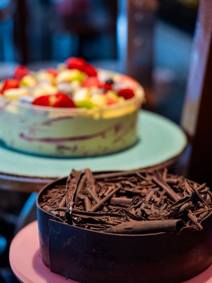 Indulge your sweet tooth with our decadent cakes. A rich chocolate cake and a fresh fruit tart are just some of the delightful options available at our dessert station during our weekend brunches.