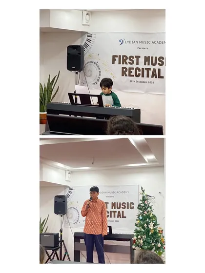 A snapshot of two performers from our First Music Recital, one on piano and one singing.