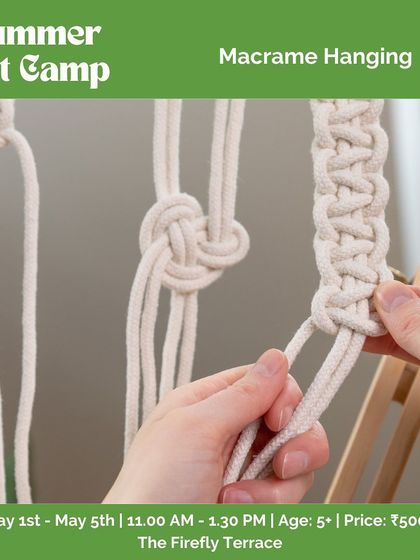 Macrame is a beautiful and mindful craft we introduce in our camps. This image shows the process of knotting cords to create intricate patterns for a plant hanger or wall decor.