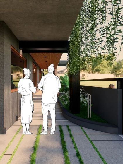 For the Gurukrupa Residence, nestled in the Western Ghats, I designed a contemporary home with a strong connection to its surroundings. This view shows a covered walkway with hanging creepers, creating a green corridor that links different parts of the house.