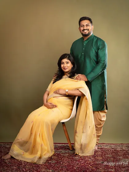 Celebrating your journey with the richness of tradition. This couple's portrait, with the mom-to-be in a radiant yellow saree and her partner in a coordinating kurta, showcases the vibrant and elegant style of my traditional maternity shoots.