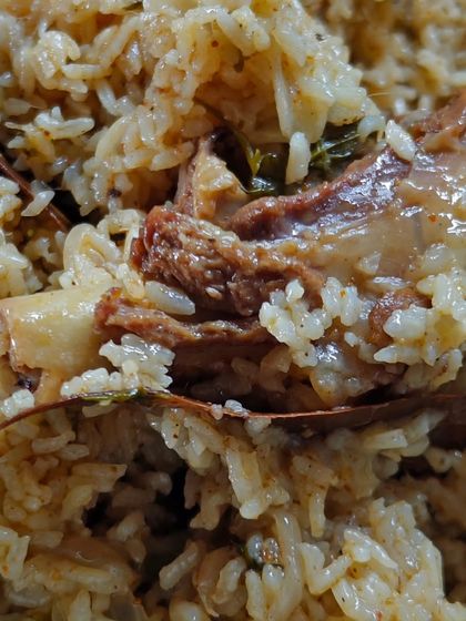 A close-up of my homestyle mutton pulao, a comforting one-pot meal. The tender mutton and fragrant rice cooked together create a dish that is simple yet incredibly satisfying.