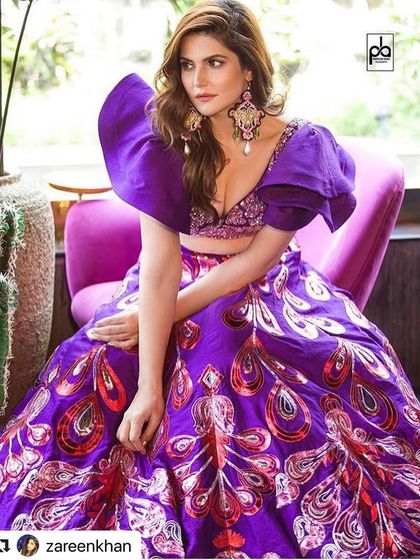 A high-fashion look for Zareen Khan with voluminous, textured waves.